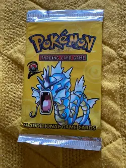 HeavyU Pokemon Base 2 Set Sealed Booster Pack Unweighed - Image 1