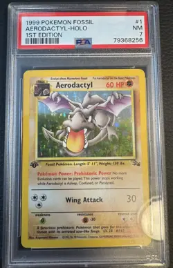 PSA 7 1999 POKEMON FOSSIL #1 AERODACTYL-HOLO 1st Edition - Image 1