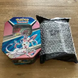 Pokemon Sylveon Tin & cards, GUARANTEED ONE RARE CARD Pokemon TCG Collectible - Image 1