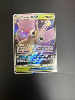 Venomoth GX 12/214 SM - Unbroken Bonds Holo NM/M Pokemon Card - Image 1