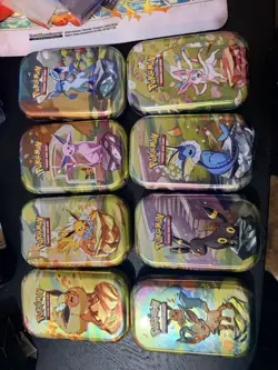 Pokemon Prismatic Evolutions Mini-Tins Complete Set with Display Box (NO PACKS) - Image 1