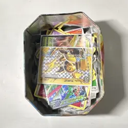 Pokemon TCG Mixed Card Lot in Collectible Tin - Image 1