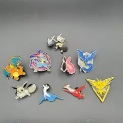 Official Pokemon Pin Lot 9x 25th Charizard Shiny Eevee Latios Latias GO - Image 1