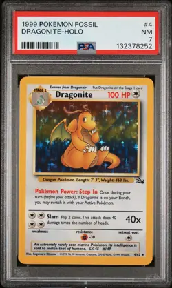 1999 POKEMON FOSSIL #4 DRAGONITE-HOLO PSA 7 - Image 1