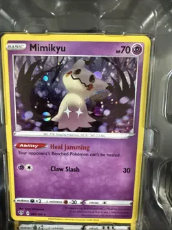 Opened Pokemon TCG: Mighty Mysterious Mimikyu Tin - Image 3