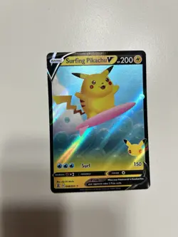 Pokemon TCG Surfing Pikachu v Celebrations Holo Ultra Rare Card 008/025 - Image 1