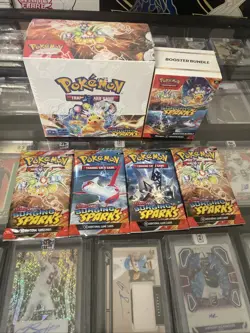 Pokemon TCG Surging Sparks Booster Box + Booster Bundle + 4 Surging Spark Packs - Image 1