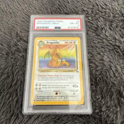 1999 POKEMON FOSSIL #4 DRAGONITE-HOLO PSA 6 - Image 1