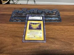 Pokemon TCG Zapdos Fossil 15/62 Holo Rare 1999-2000 Cosmos CGC 7 NEAR MINT - Image 1