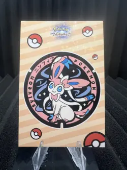 Badge Sylveon - Star Holo - Let's Go Eevee Database - Pokemon Card - Image 1
