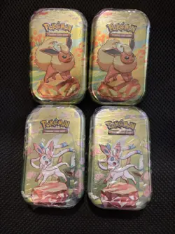 Pokemon TCG: Prismatic Evolutions Mini Tins x4 – Sealed - Image 1