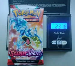 Heavy 23.18g Pokemon Tcg scarlet and violet base Booster Pack Factory Sealed New - Image 1
