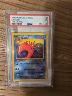 1999 Pokemon Fossil 38 Kingler 1st Edition PSA Near Mint 7 - Image 1