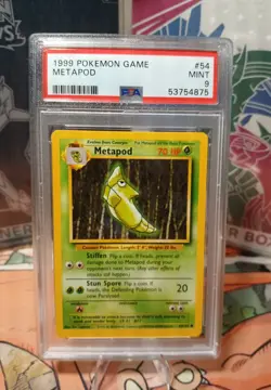1999 Pokemon Base Set Metapod #54/102 PSA 9 MINT - Image 1