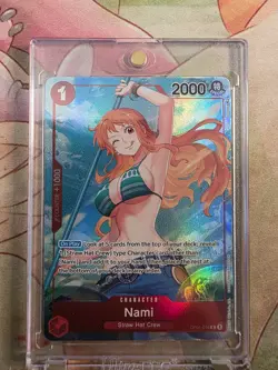 One Piece Nami OP01-016 Alternate Art. Pre-Errata First Wave Alpha Printing. - Image 1