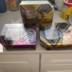 POKEMON SWSH V POWERS TINS SET - PIKACHU V, EEVEE V, & ETERNATUS V - Image 1