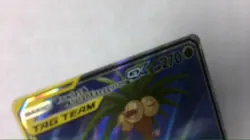 pokemon rowlet alolan exeggutor gx 215/236 - Image 5