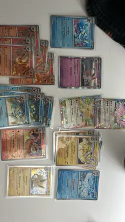 Pokemon TGC Prismatic Evolutions Bulk Lot Cards with Sleeves - Image 1