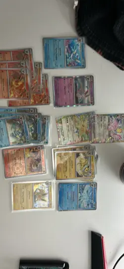 Pokemon TGC Prismatic Evolutions Bulk Lot Cards with Sleeves - Image 2