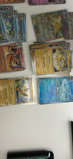 Pokemon TGC Prismatic Evolutions Bulk Lot Cards with Sleeves - Image 5