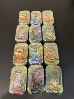 💥Pokemon Lot Of 12 Prismatic Mini Tins factory sealed 💥 - Image 1