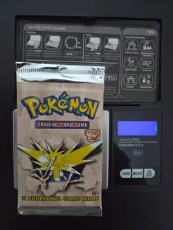 Pokemon 1st Edition Fossil Booster Pack Zapdos 21.03g - Image 1