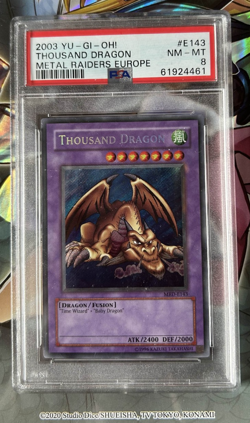 YuGiOh PSA Graded 8 Thousand Dragon MRD-E143 Secret Rare - Image 1