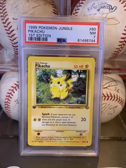 1999 Pokemon Jungle 60 Pikachu 1st Edition Red Cheeks PSA 7 - Image 1
