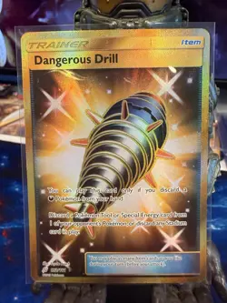 Dangerous Drill 192/181 Sun & Moon Team Up Gold Secret Rare Pokemon TCG Card NM - Image 1