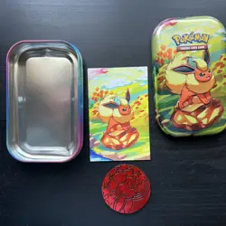 Flareon Prismatic Evolutions Mini Tin with Art Card and Coin Empty Tin - Image 1