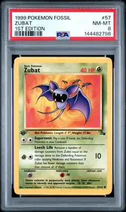 1999 POKEMON FOSSIL 1ST EDITION #57 ZUBAT PSA 8 - Image 1