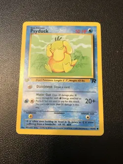 Psyduck 65/82 Team Rocket 1st Edition Pokemon Card In Mint Condition - Image 1