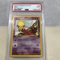 2000 Pokemon Team Rocket 1st Edition Abra 49/82 PSA 9 Mint - Image 1