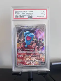 2025 POKEMON SVP EN-SV BLACK STAR PROMO #203 TEAM ROCKET'S WOBBUFFET PSA 9 - Image 1