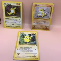 Vtg Pokemon Lot-3, Pikachu Spark Basic 50 HP, Sandshrew 62/102, & Raichu 16/130 - Image 1