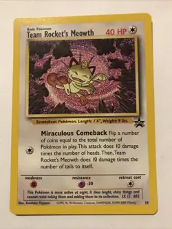 Team Rocket's Meowth Black Star Promo Pokemon Card #18 - Image 1