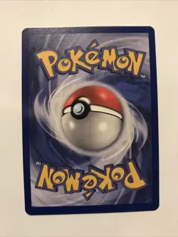 Team Rocket's Meowth Black Star Promo Pokemon Card #18 - Image 2