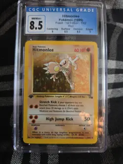 CGC 8.5 Hitmonlee Fossil 1st Edition 7/62 Cigar Stain Error Holo Pokemon Card - Image 1