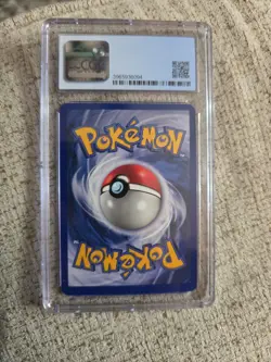 CGC 8.5 Hitmonlee Fossil 1st Edition 7/62 Cigar Stain Error Holo Pokemon Card - Image 3