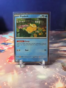 SWIRL Psyduck MEP 007 Cosmos Holo Pokemon TCG Promo - Image 1