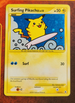 Pokemon Surfing Pikachu Holo Rising Rivals#114/111 swirl - Image 1