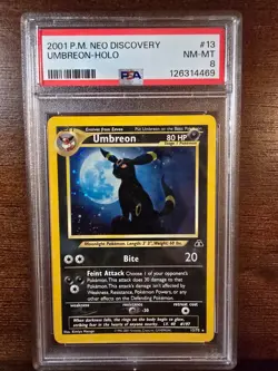 Umbreon 13/75, Pokemon Neo Discovery Holo (PSA 8) - Image 1