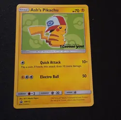 Ash’s Pikachu SM112 Ultra Rare Non Holo Exclusive Promo Pokemon Card - Image 1