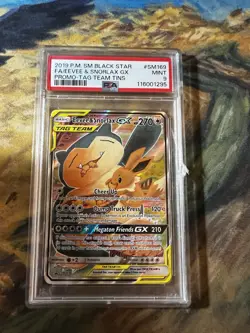 *Damaged* 2019 Pokemon Eevee & Snorlax Tag Team GX SM169 Promo PSA 9 - Image 1