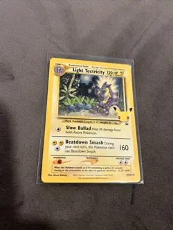 Pokemon TCG Celebrations Light Toxtricity SWSH137 Black Star Promo Holo SWIRL NM - Image 1