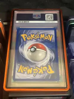 Base Set Charizard Holo PSA 7 004/102 with Mettalic Guard Pokemon Card NEW CERT - Image 2