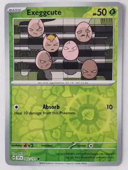 REVERSE HOLO Exeggcute 002/191 NM / M Surging Sparks Pokemon Card - OKUBO Art - Image 1