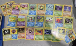 Lot Of 26 First Edition Fossil Original Pokemon Cards - Image 1