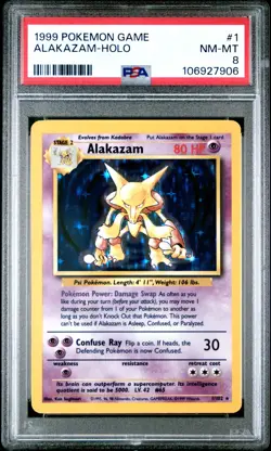 1999 Pokemon Game 1/102 - Alakazam-Holo PSA 8 - Image 1