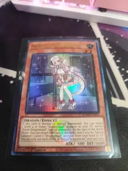 Yugioh! Nurse Dragonmaid - BLMM-EN054 - Ultra Rare - 1st Edition Near Mint, Engl - Image 1